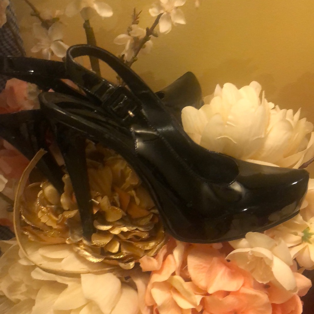 Black Aldo sling backs